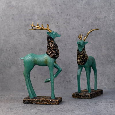 Teal and gold reindeer statues by Home 360