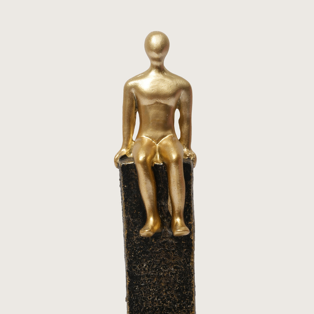 Motivational Gold & Black Figurines on Textured Steps