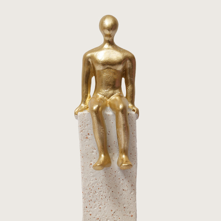 Motivational Gold & White Figurines on Textured Steps