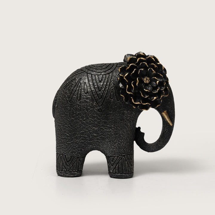 Textured Black Elephant Sculpture with Gold Flower Headpiece