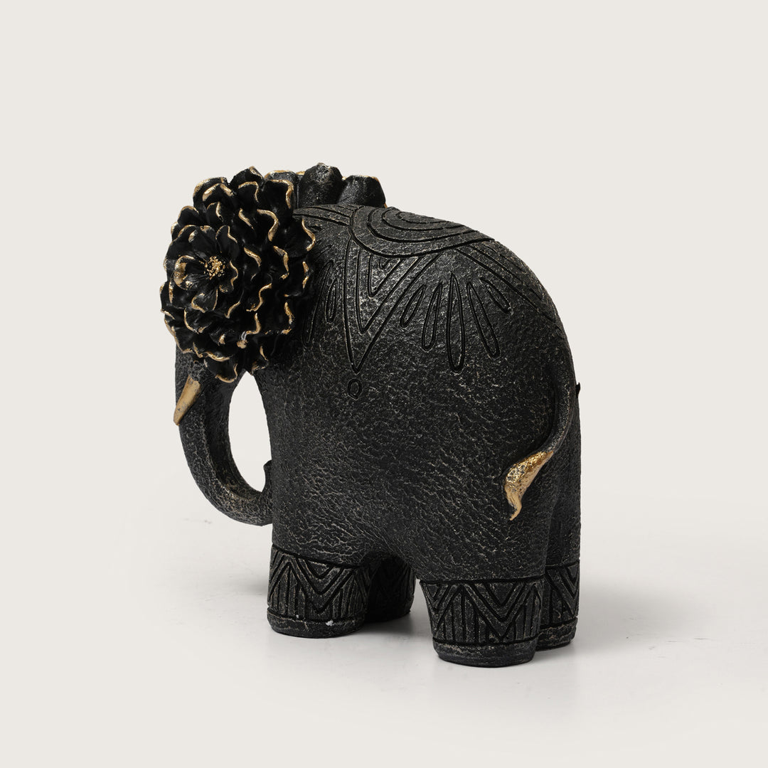 Textured Black Elephant Sculpture with Gold Flower Headpiece