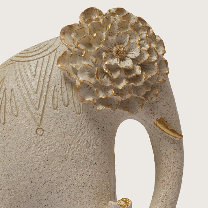 Textured Beige Elephant Sculpture with Gold Flower Headpiece