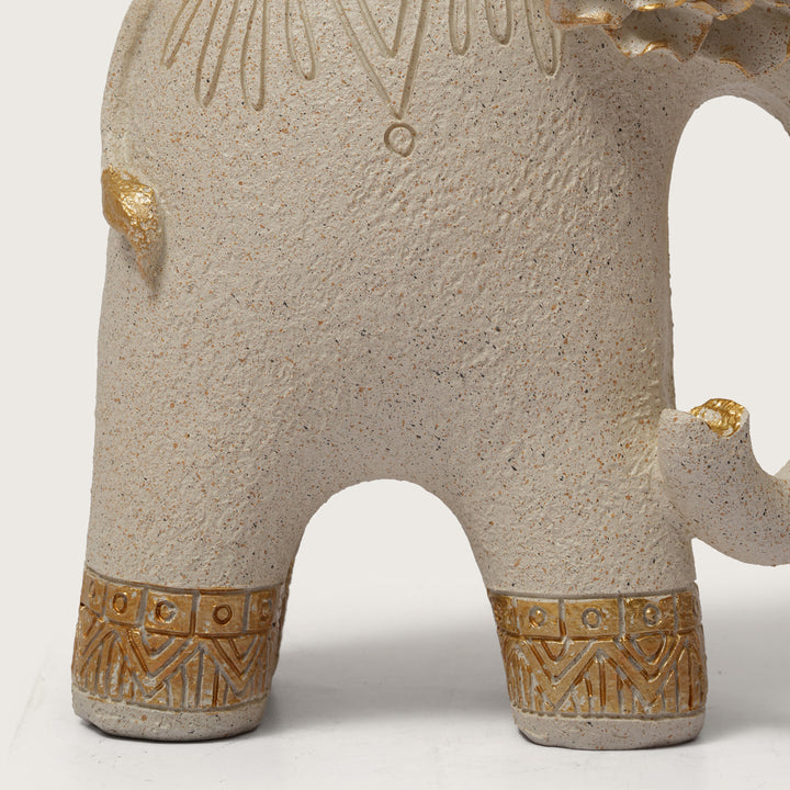 Textured Beige Elephant Sculpture with Gold Flower Headpiece