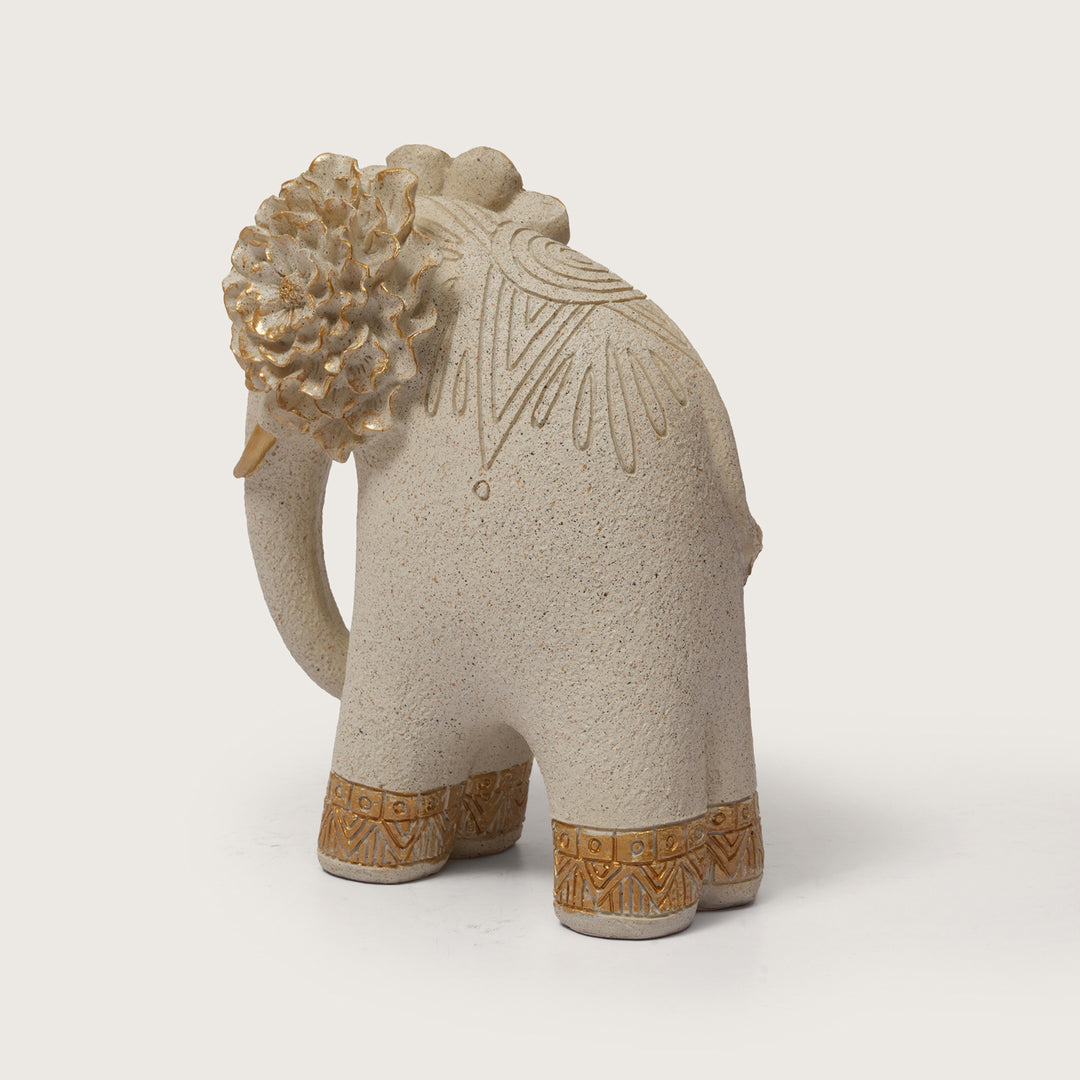 Textured Beige Elephant Sculpture with Gold Flower Headpiece