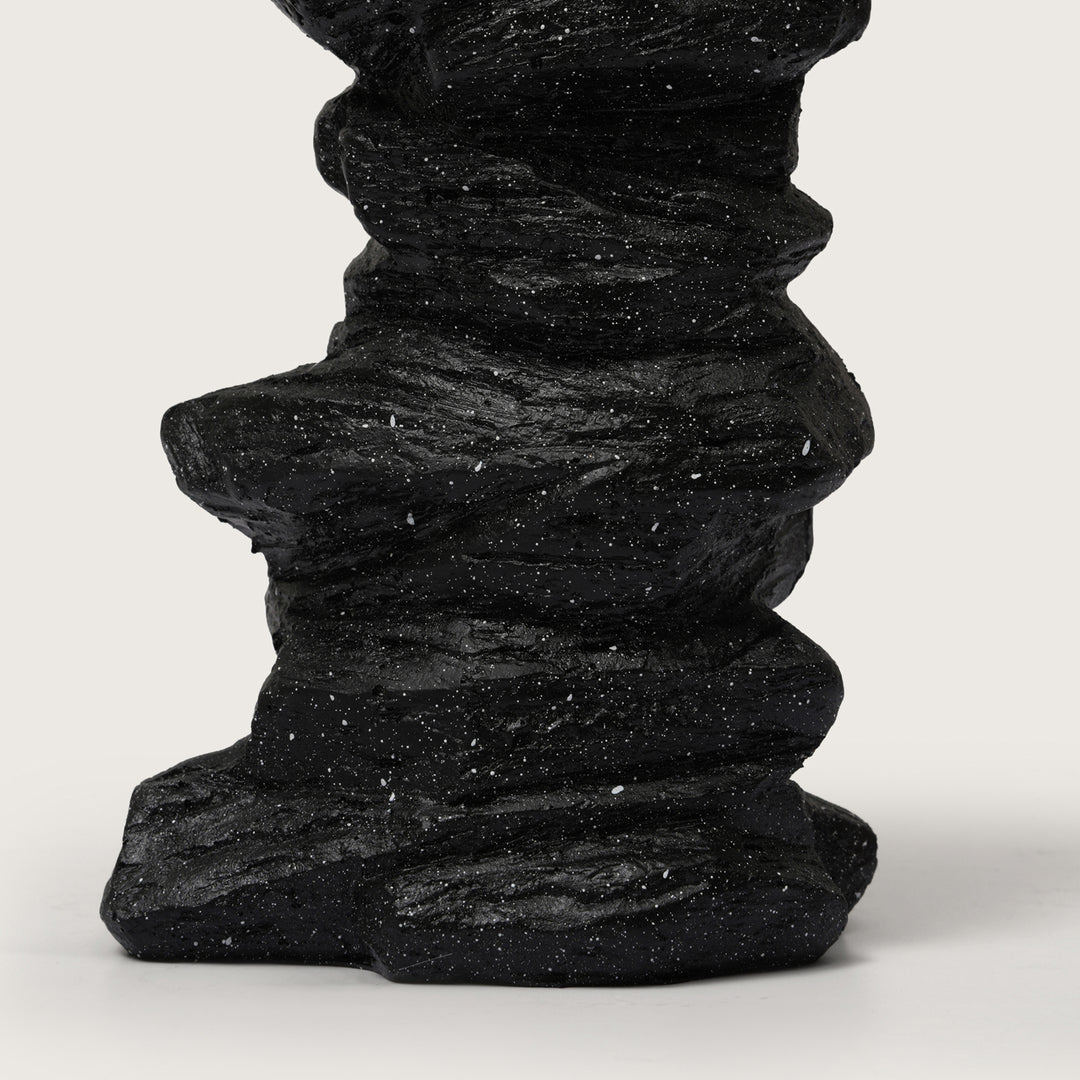 Abstract Guitarist Figurine on Stacked Black Rock Sculpture
