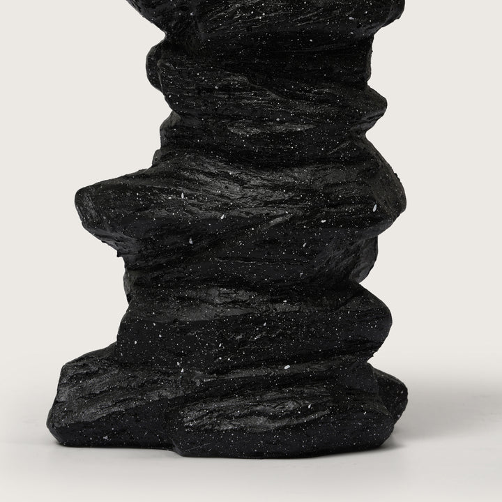 Abstract Guitarist Figurine on Stacked Black Rock Sculpture