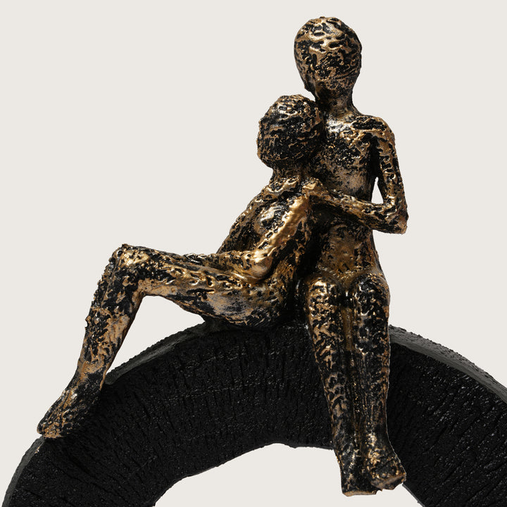 Abstract Figurine of Lovers Sitting on a  Base