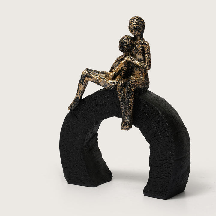Abstract Figurine of Lovers Sitting on a  Base