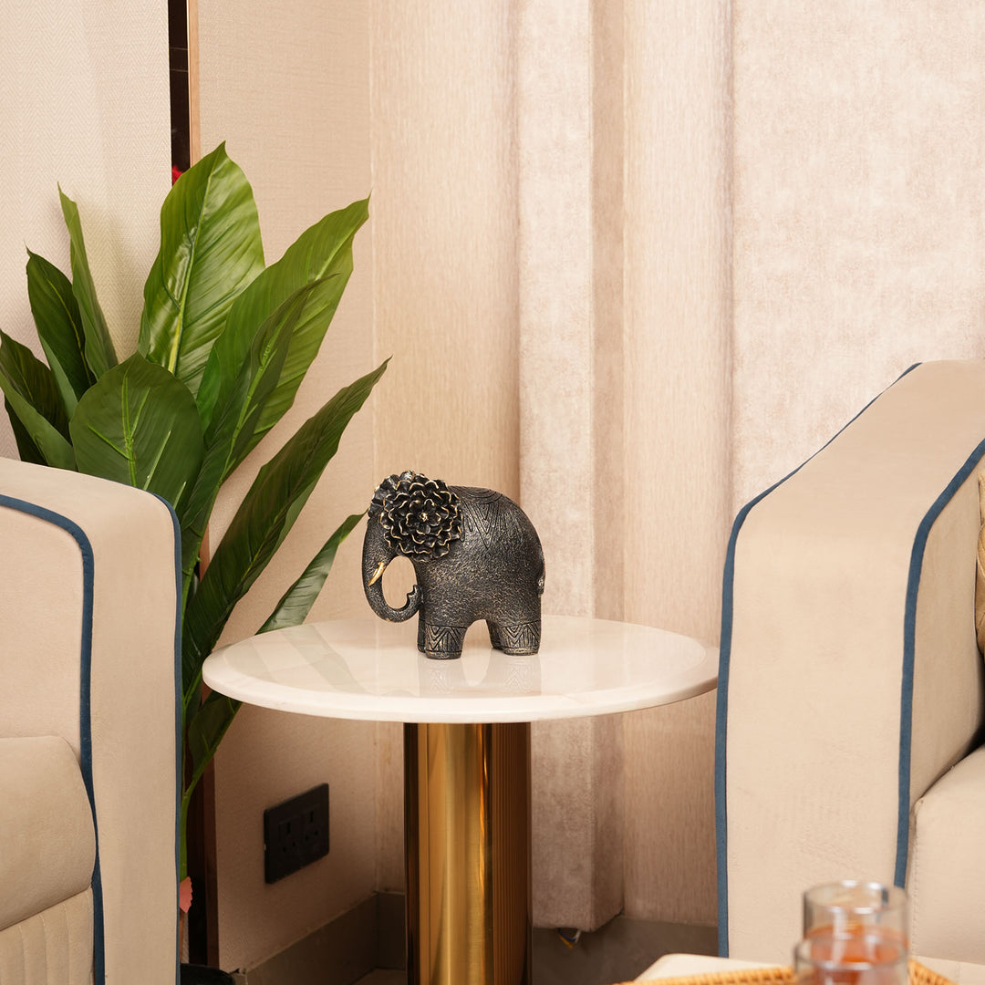Textured Black Elephant Sculpture with Gold Flower Headpiece