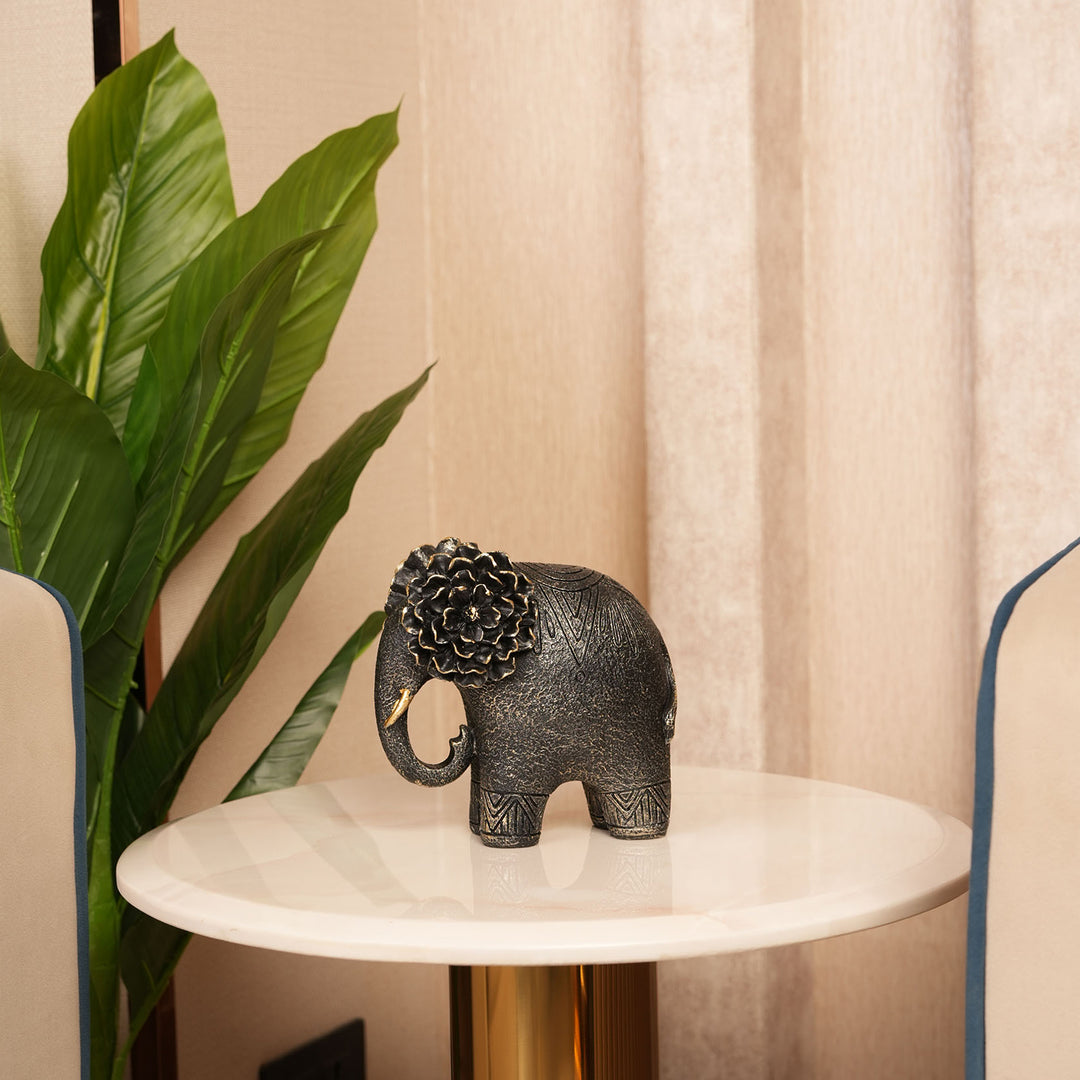 Textured Black Elephant Sculpture with Gold Flower Headpiece