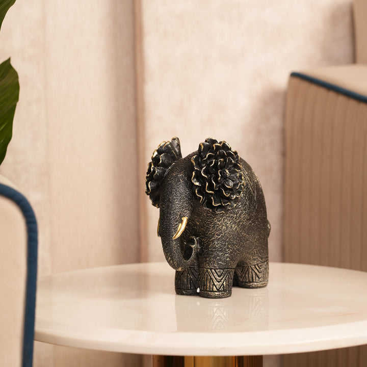 Textured Black Elephant Sculpture with Gold Flower Headpiece