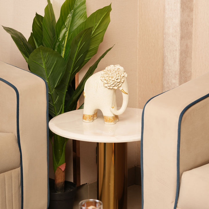 Textured Beige Elephant Sculpture with Gold Flower Headpiece