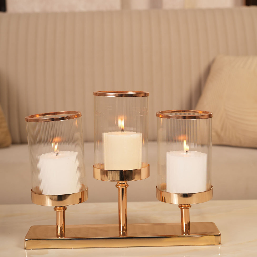 Refined Gold Triple-Stem Candle Holder with Minimalist Rectangular Base