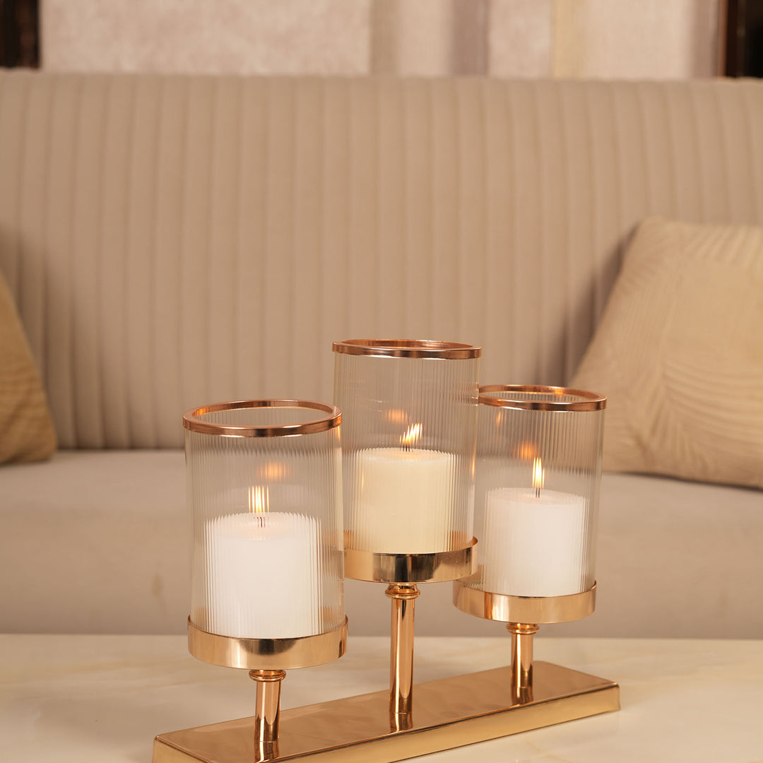 Refined Gold Triple-Stem Candle Holder with Minimalist Rectangular Base