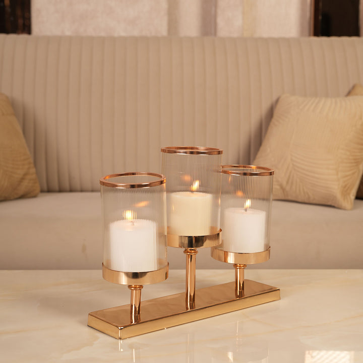Refined Gold Triple-Stem Candle Holder with Minimalist Rectangular Base