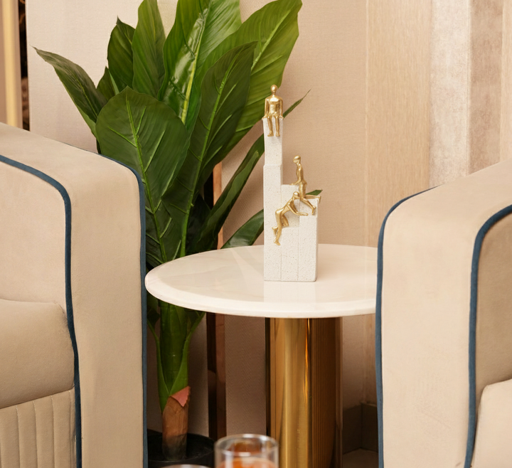 Motivational Gold & White Figurines on Textured Steps