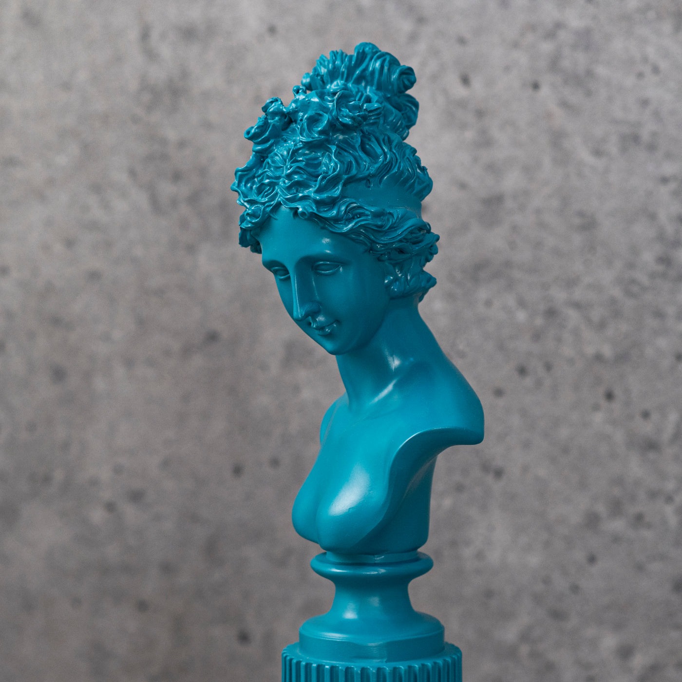 Teal lady statue by Home 360