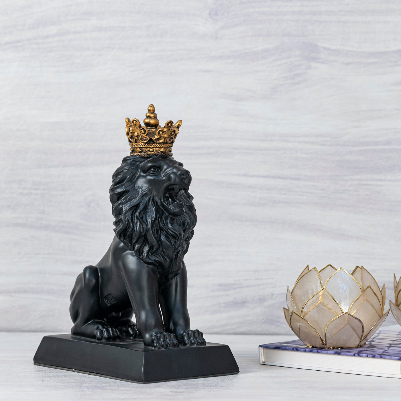 Black and gold lion decorative piece by Home 360