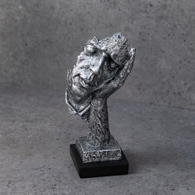 Silver face and hand statue by Home 360