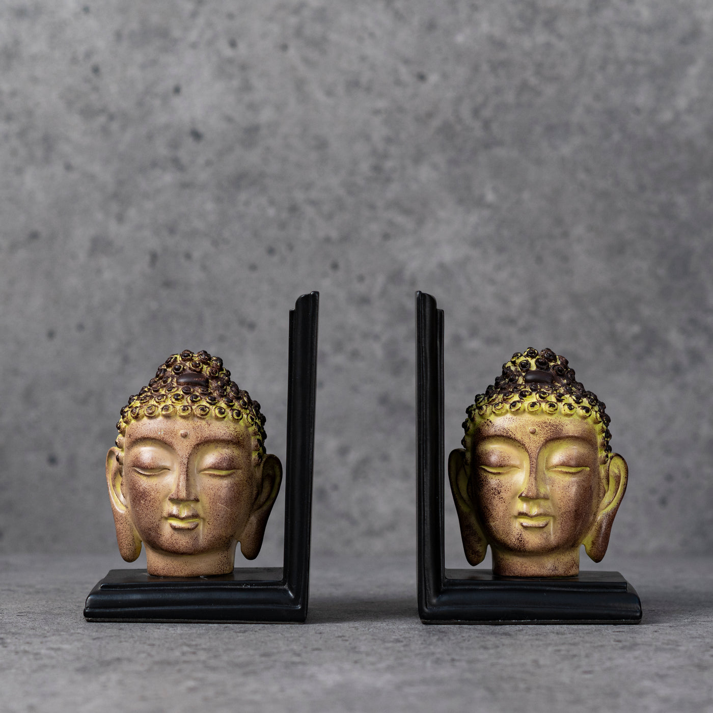 Antique buddha bookends by Home 360