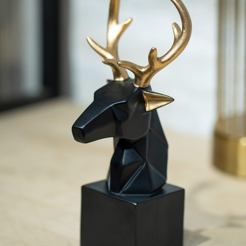 Black and gold caribou decor by Home 360